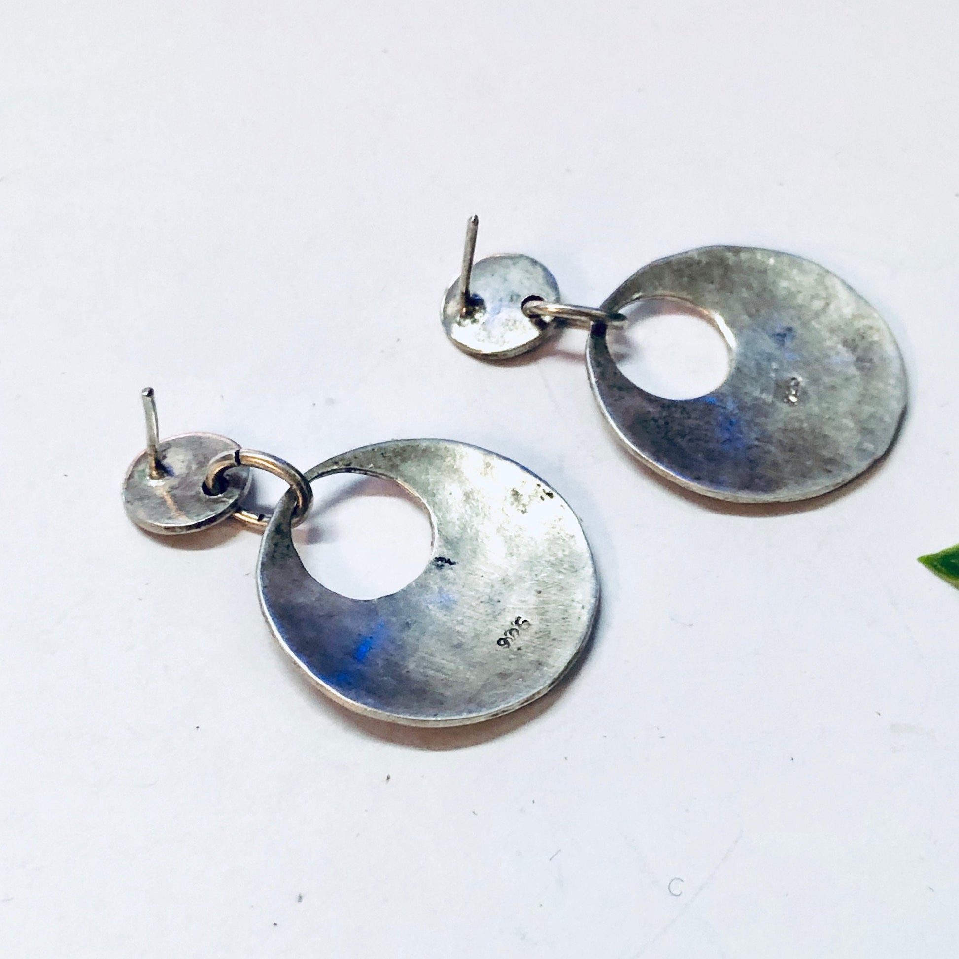 Vintage hammered silver dangle earrings with cut-out circles for pierced ears