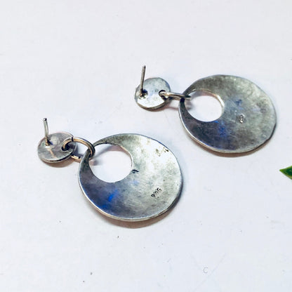 Vintage hammered silver dangle earrings with cut-out circles for pierced ears