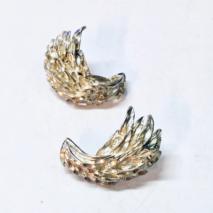 Pair of vintage silver feather or leaf shaped earrings with intricate detailing and sparkly finish, suitable for pierced ears, unique 925 sterling silver jewelry.