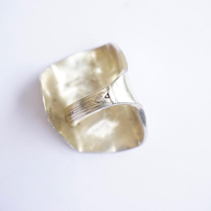 Vintage sterling silver spoon ring, handcrafted into a unique bent design. Size 8 US silver statement ring.