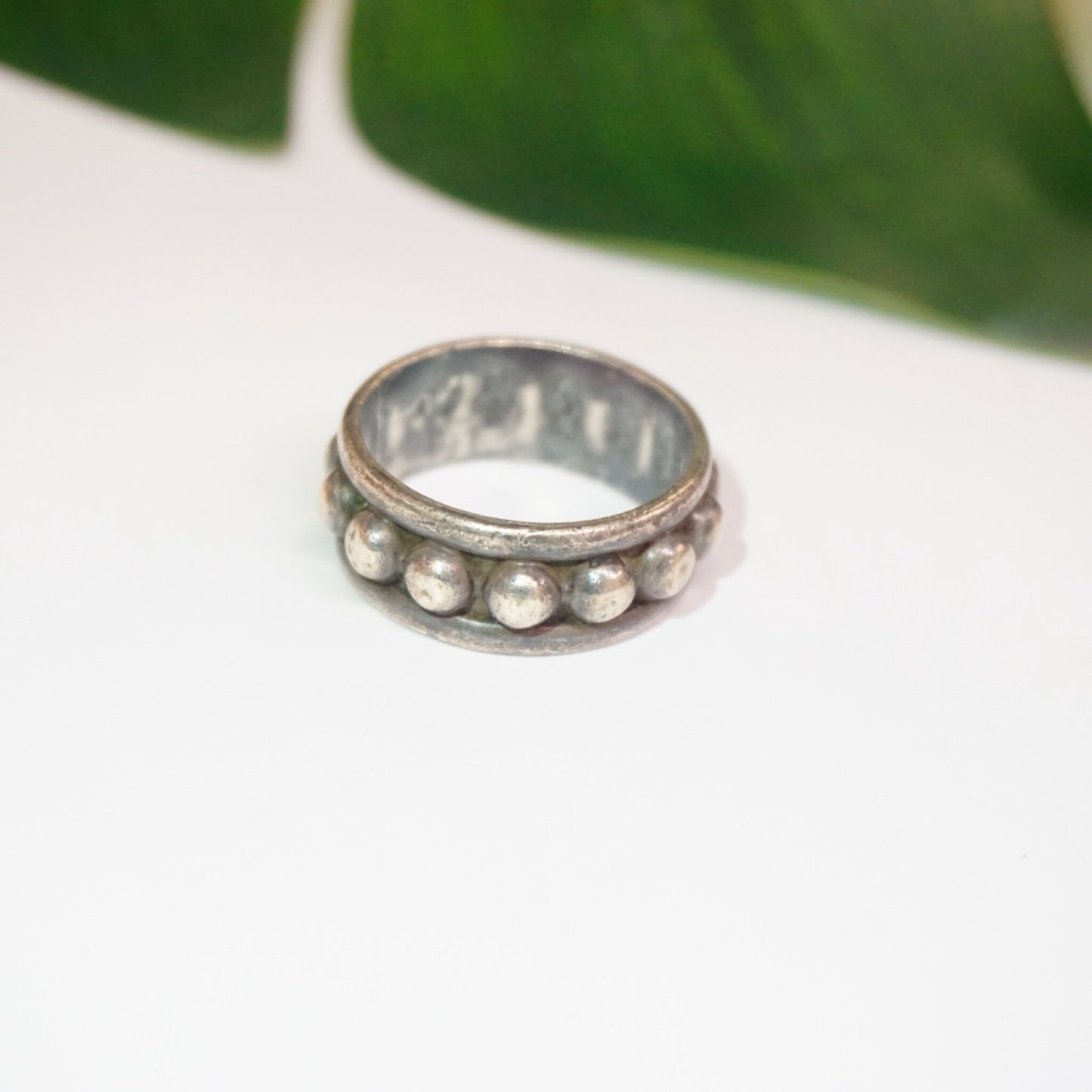 Vintage hammered sterling silver ring with circular details and tarnished finish, large men's silver ring stamped 925 Mexico.