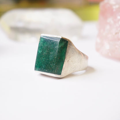 Vintage sterling silver ring with green square druzy quartz stone on white background