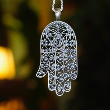 Vintage Sterling Silver Filigree Hamsa Hand Pendant with intricate scrollwork design, crafted in Israel from 925 silver, detailed protective talisman jewelry piece