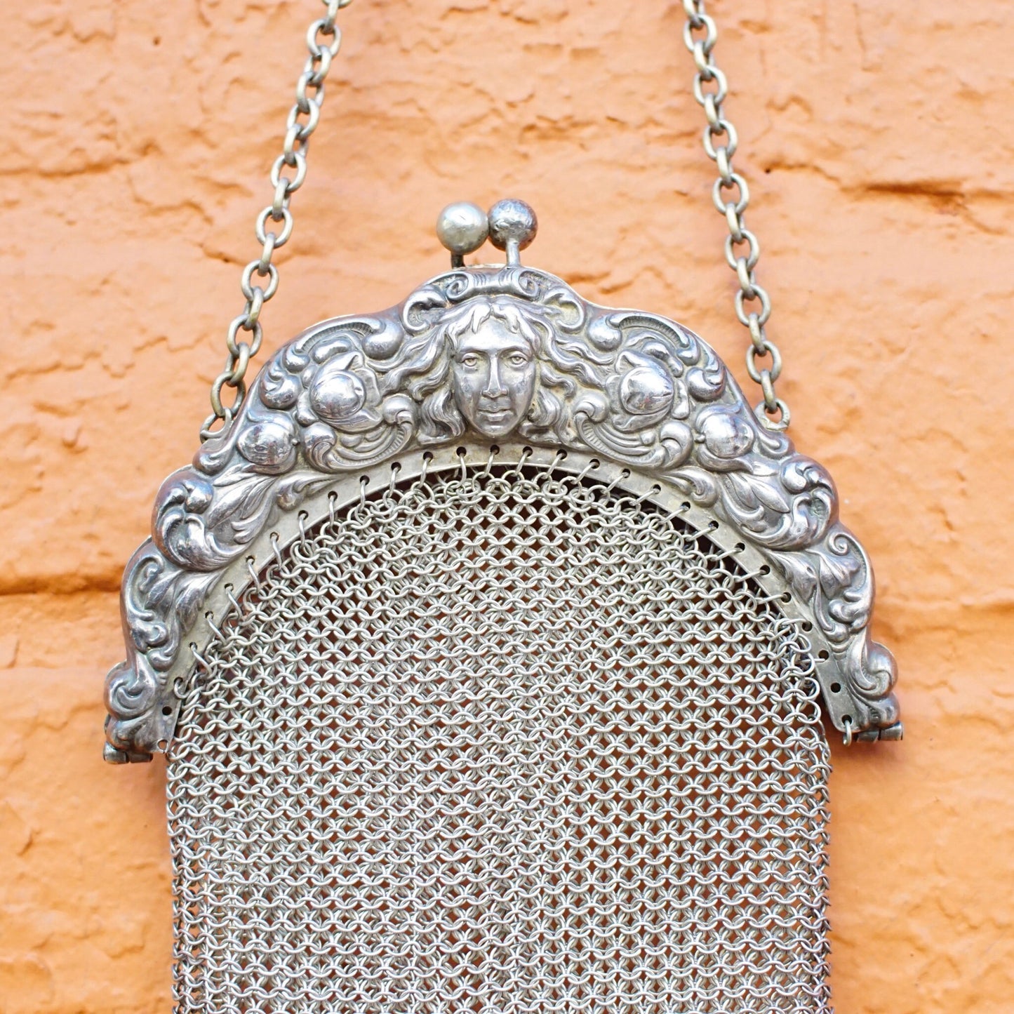 Antique Art Nouveau sterling silver chain mail purse with embossed ornate face on frame, silver mesh coin purse in amazing vintage condition, 925 silver hallmark.