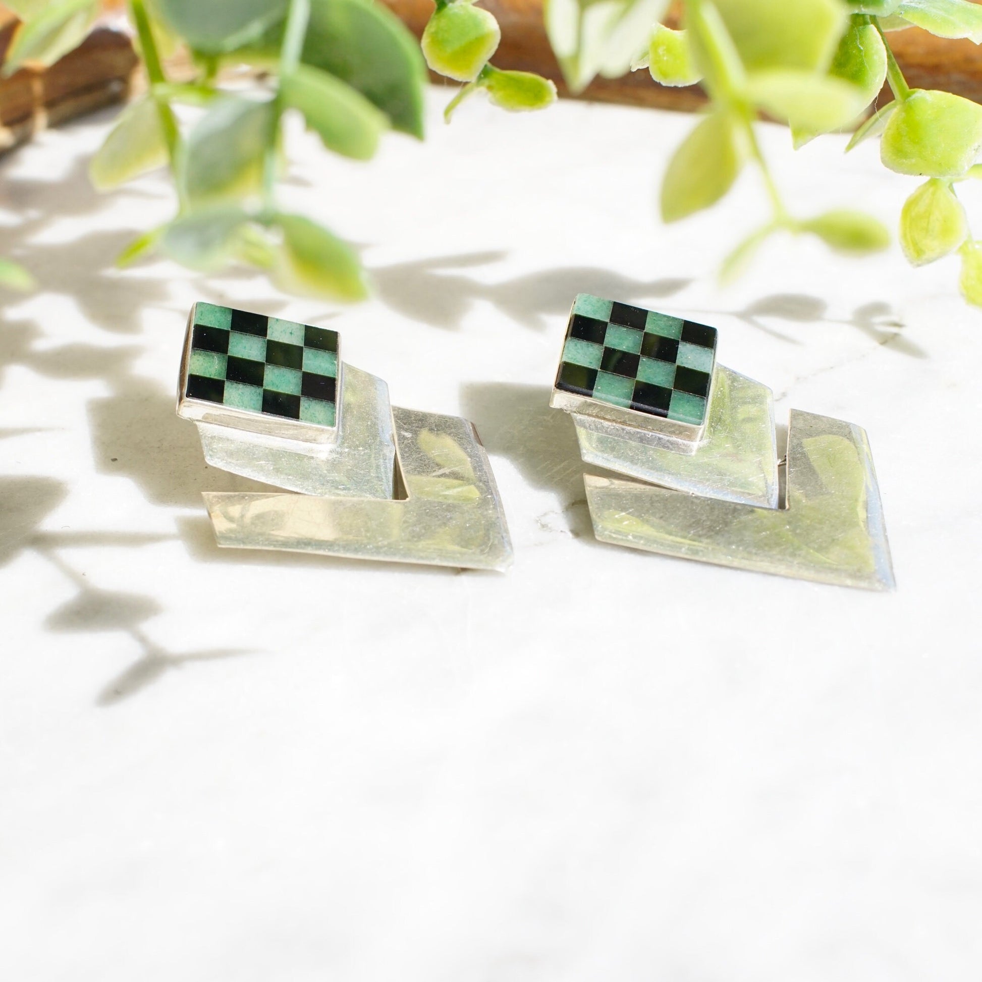 Vintage sterling silver hinged checker earrings with inlaid green glass or stone squares, creating a unique modernist dangle post earring design in 925 silver.