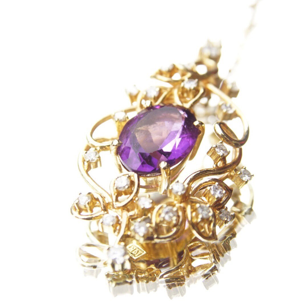 Vintage 14K gold pendant choker necklace featuring an oval-cut faceted amethyst gemstone set in an ornate diamond-encrusted gold frame, with a total length of 14 3/4 inches.