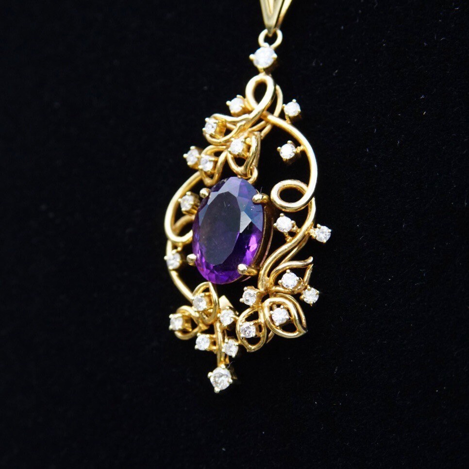 Vintage 14K gold pendant choker necklace featuring a faceted amethyst stone in an ornate diamond-studded gold frame, measuring 14 3/4 inches long.