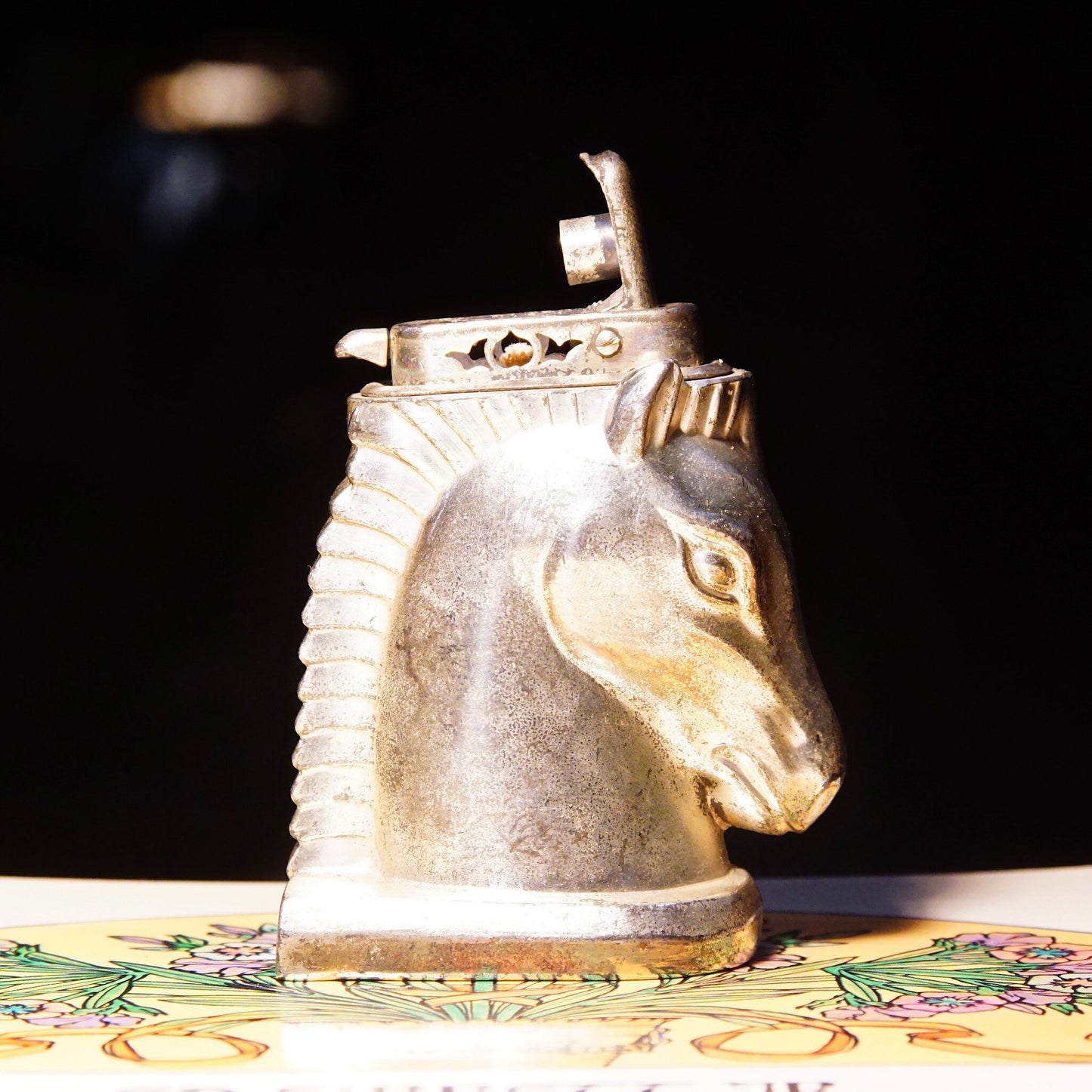 Vintage silver-plated horse head table lighter made in Occupied Japan, collectible butane lighter measuring 2 3/4 inches, not tested for functionality.