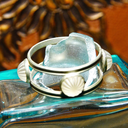 Antique 1920's Austrian blue crystal perfume bottle with frosted glass figural dauber, carved glass stopper, and pewter mounts on iridescent glass tray.