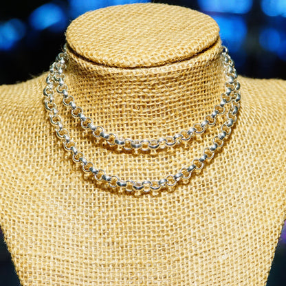 Vintage sterling silver rolo chain necklace with 1/4 inch interlocking bead links, displayed on burlap mannequin. Heavy, long unisex silver chain measuring 23 3/4 inches in length.