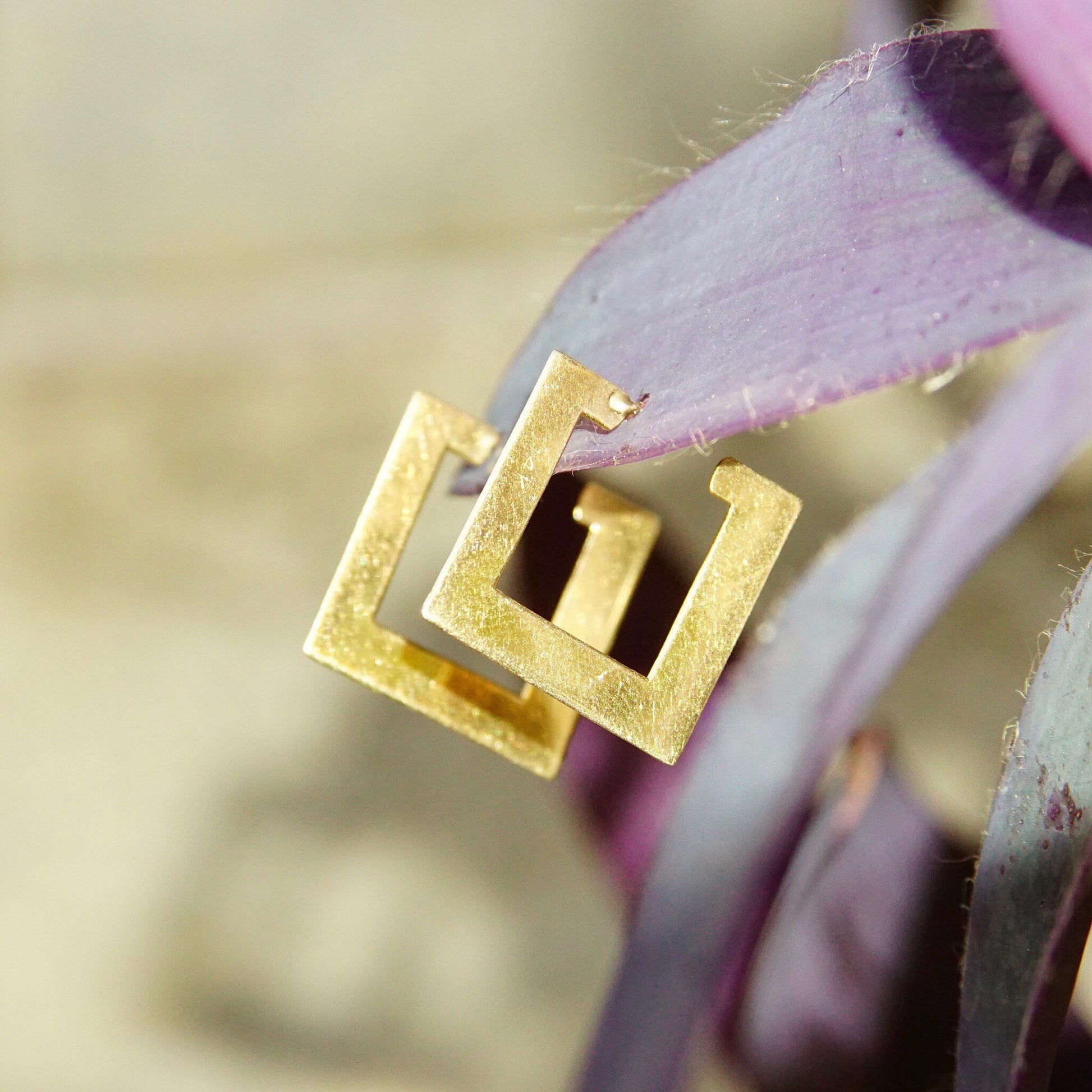 Vintage 14K yellow gold geometric square hoop earrings with a sleek, minimalist design. Flat, square-shaped hoops measure 3/4 inch. 585 gold jewelry with a sexy, modern aesthetic.