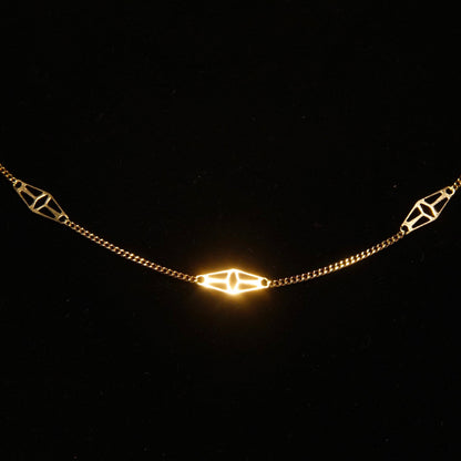 Vintage 14K yellow gold filigree station necklace, elegant Italian 585 gold chain, delicate geometric design, 18 1/4 inches long.