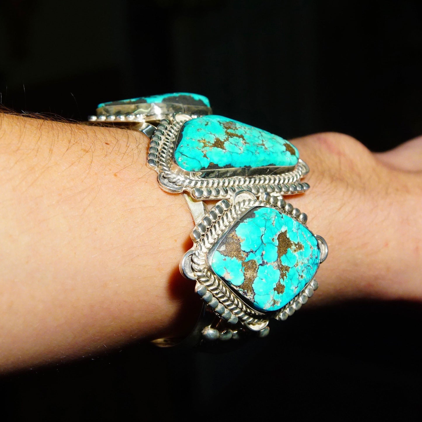 Vintage Native American silver cuff bracelet with three large chunky turquoise stones, made in Mexico, measuring 5 3/4 inches long.