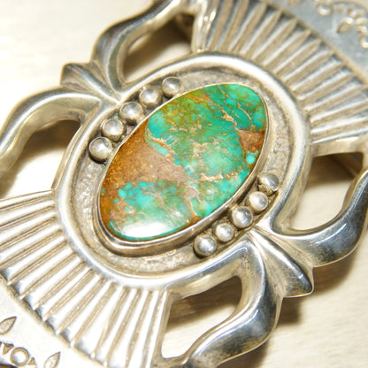 Vintage Native American sterling silver turquoise belt buckle with intricate sandcast design by renowned Zuni artisan Art Acoya