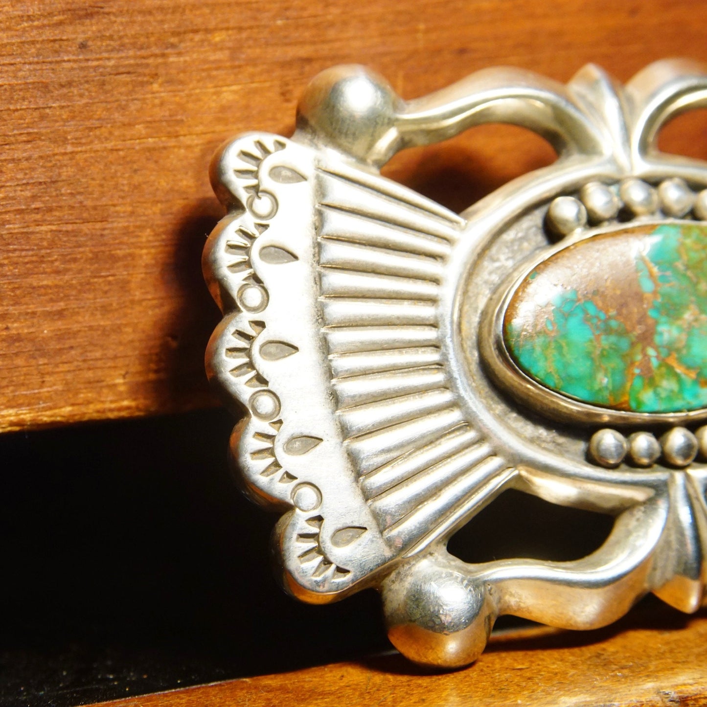 Vintage Native American sterling silver turquoise belt buckle featuring intricate sandcast designs by renowned Zuni artisan Art Acoya, measuring 2 7/8 inches wide.