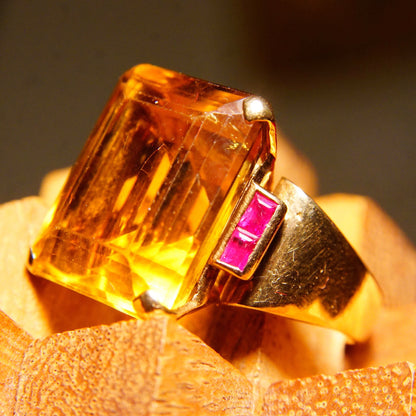 Large emerald-cut citrine gemstone cocktail ring in 14K yellow gold setting with ruby accents, estate jewelry, size 6 3/4 US.