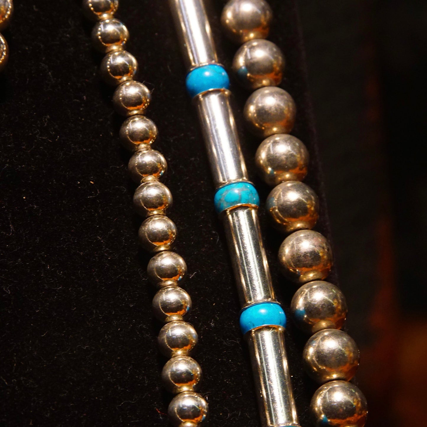 Vintage Navajo bench barrel bead necklace with sterling silver tube beads, blue turquoise spacer beads and pearl beads, measuring 32 1/2 inches long.