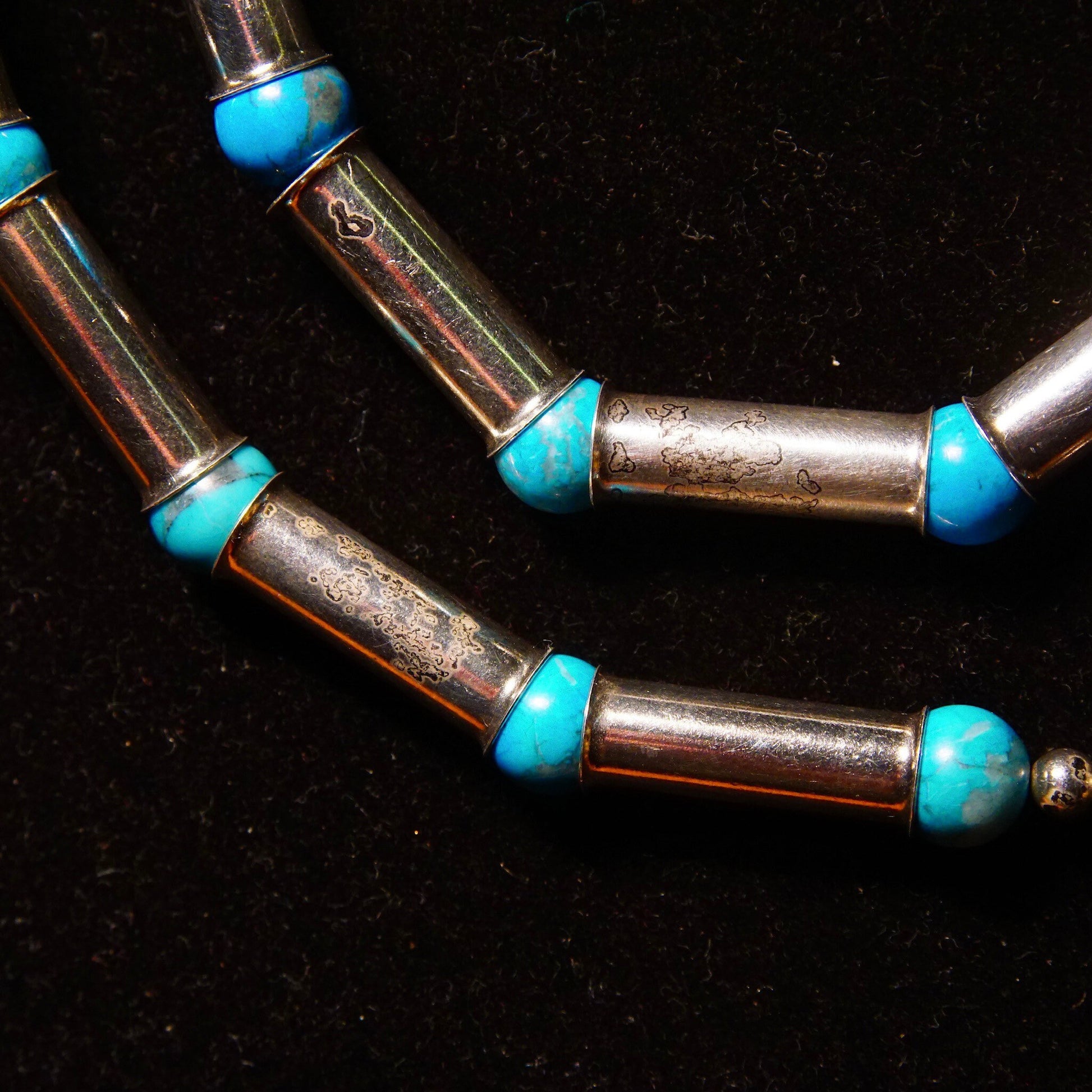 Vintage Navajo sterling silver tube bead necklace with turquoise pearl bench barrel beads and blue turquoise spacer beads, measuring 32 1/2 inches long.