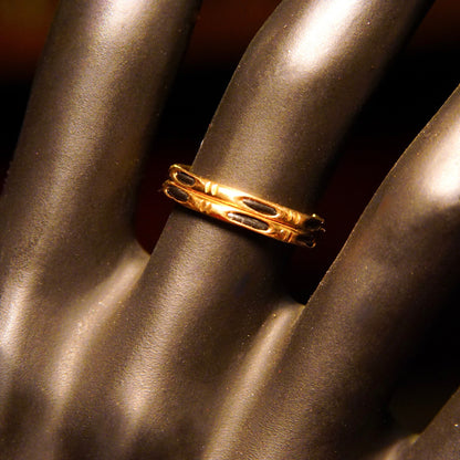 Antique 14K gold elephant hair ring featuring two stacked gold bands with black strand accents in a bamboo style, size 4 3/4 US.