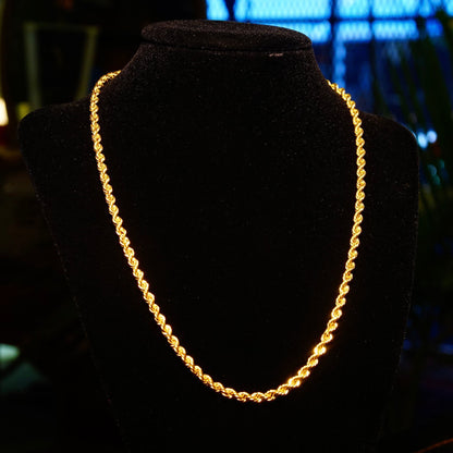 Vintage 14K yellow gold hollow rope chain necklace displayed on black velvet jewelry stand, unisex classic gold chain, 585 jewelry available in 16 to 24 inch lengths