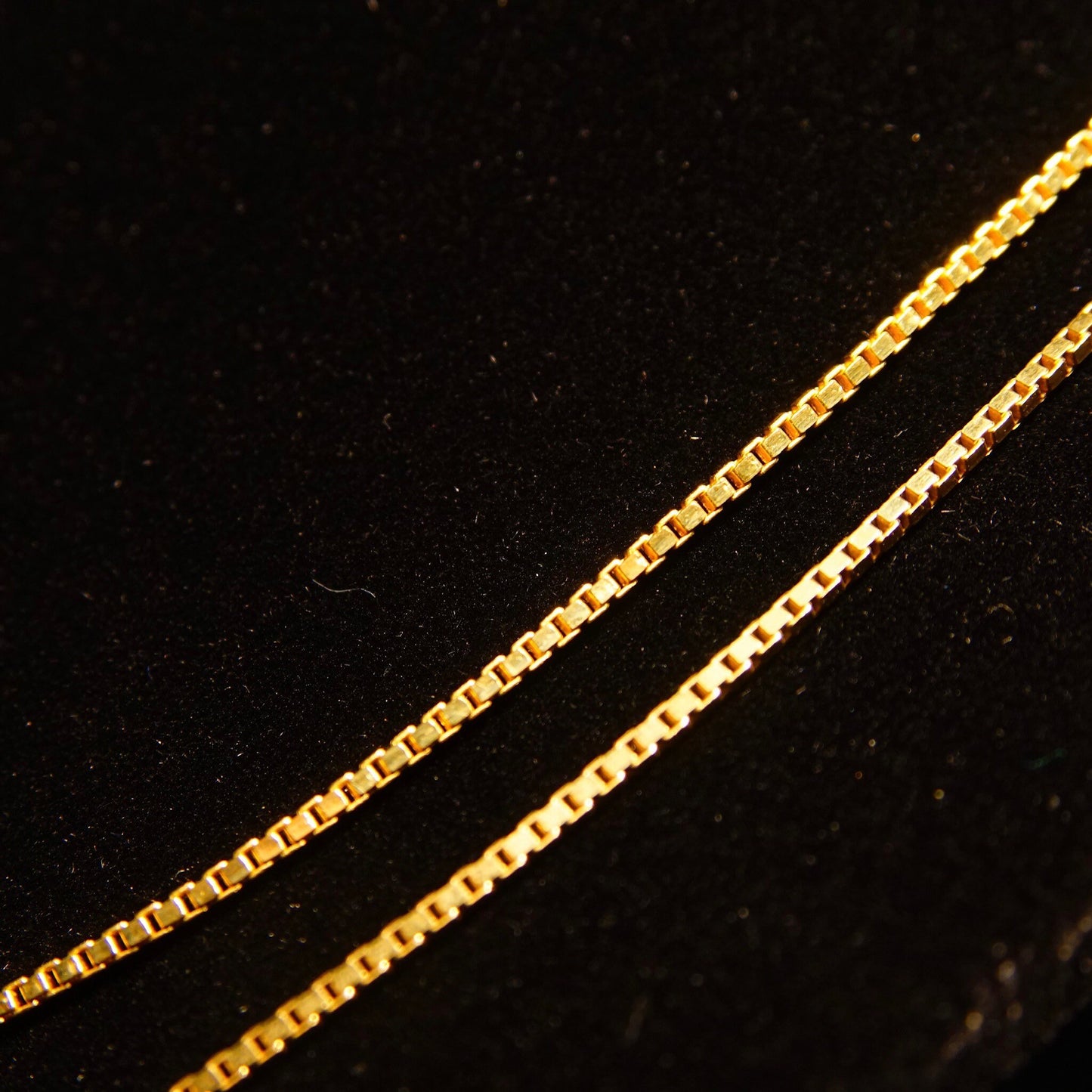 Vintage 14K yellow gold Italian box chains on black background, 1.5mm wide, 16 and 18 inches long, suitable for pendants, 585 gold jewelry.