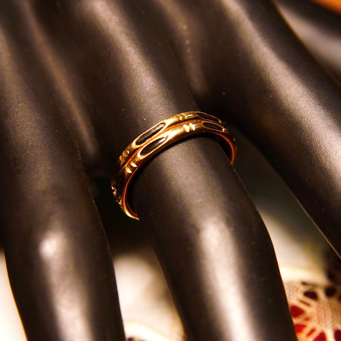 Antique 14K gold elephant hair ring featuring two stacked gold bands with black strand accents in a bamboo style design, size 4 3/4 US.