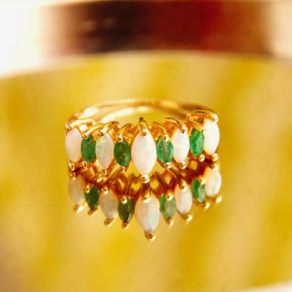 14K gold marquise opal and emerald eternity ring, multi-stone cluster cocktail estate jewelry, size 6 1/4 US, on yellow background