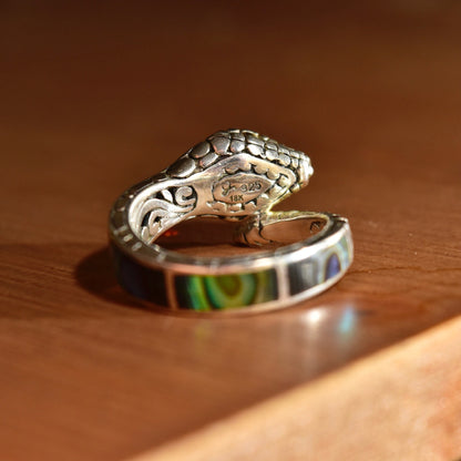 Vintage sterling silver snake ring with 18K gold accents and iridescent abalone shell inlay, depicting a coiled rattlesnake with engraved details and gold eyes, ring size 7 1/2 US.