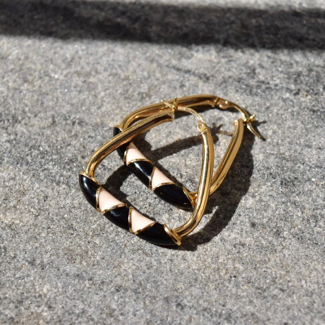 14K gold hoop earrings with black and beige enamel triangle designs, modernist statement earrings measuring 35mm in diameter