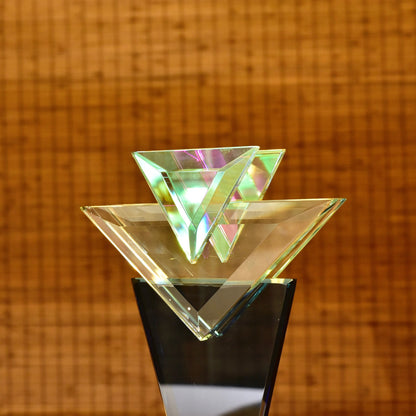 Modernist iridescent clear and black glass geometric tabletop sculpture by Stephen Jon Clements from 1989.