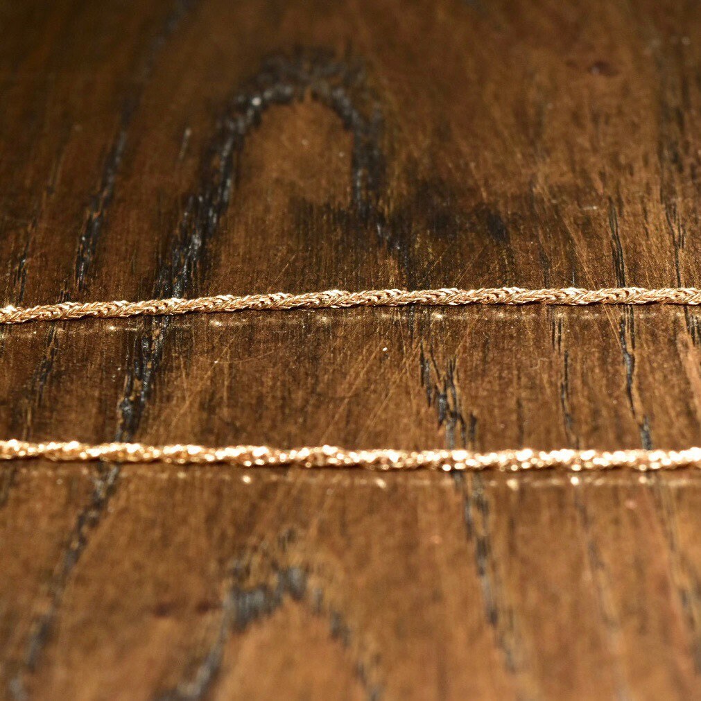 14K yellow gold diamond bar necklace with shared prong setting on a delicate 2mm Singapore chain, creating an elegant 17 1/2 inch collar necklace