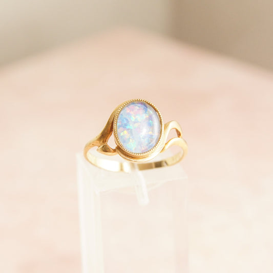 10K yellow gold ring with round opal triplet center stone, ornate bezel setting, size 8 1/4 US, estate cocktail ring jewelry featuring October birthstone
