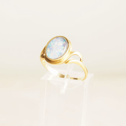 10K yellow gold cocktail ring featuring an oval opal triplet center stone, estate jewelry piece, October birthstone, size 8 1/4 US