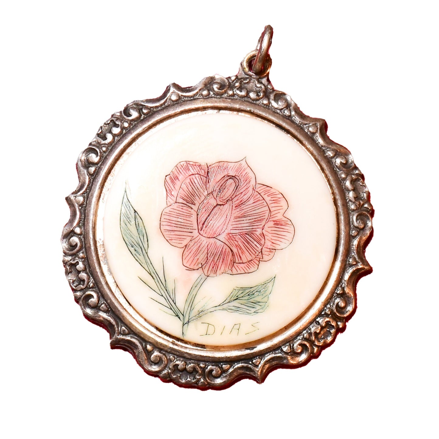 Signed scrimshaw pendant featuring a hand-etched and inked red flower on bovine bone, set in an ornate sterling silver repousse frame measuring 44mm in diameter.