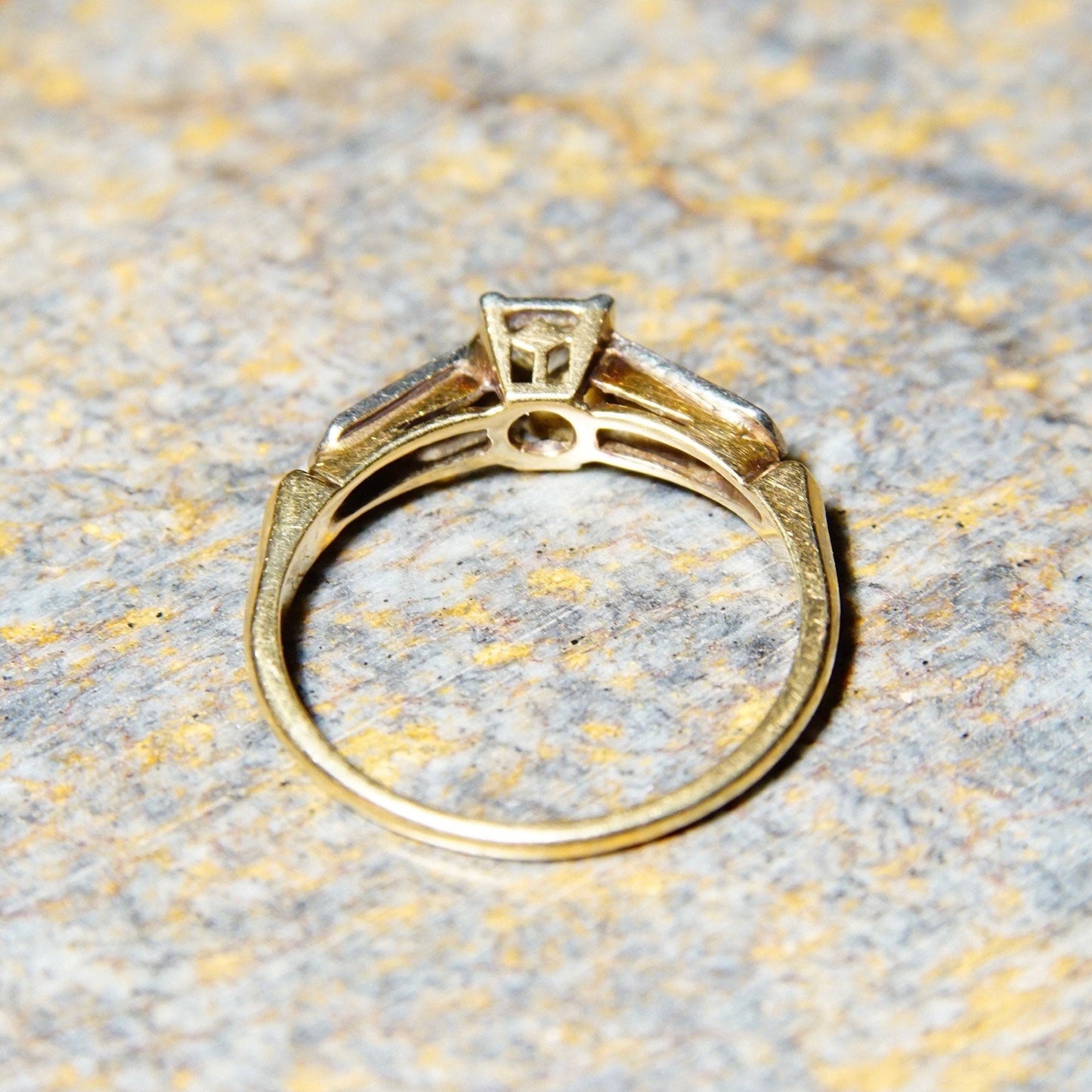 Vintage 14K and 18K gold diamond engagement ring with yellow gold band and white gold settings, featuring a 0.14 carat old European cut center stone, ring size 6 1/4 US.