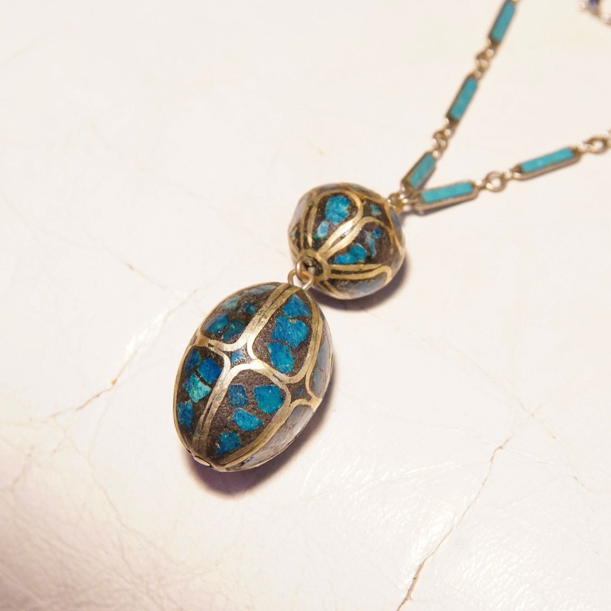 Vintage Indian mosaic turquoise brass inlay bauble pendant necklace with blue enamel on a silver link chain, 18 inches long, featuring a two-bead drop pendant design.