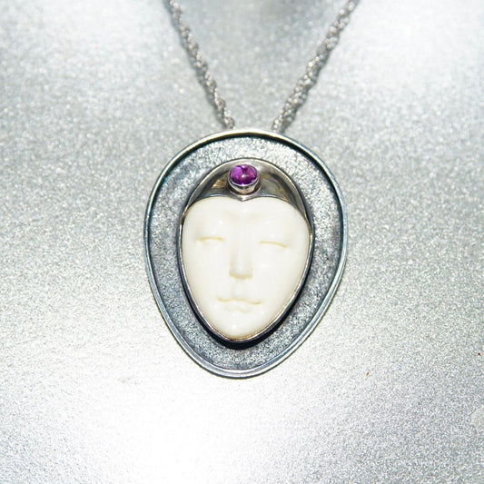 Vintage Sajen sterling silver pendant with carved bovine bone moon goddess and amethyst on silver chain, unique extraterrestrial themed 925 jewelry, 1.5 inches.