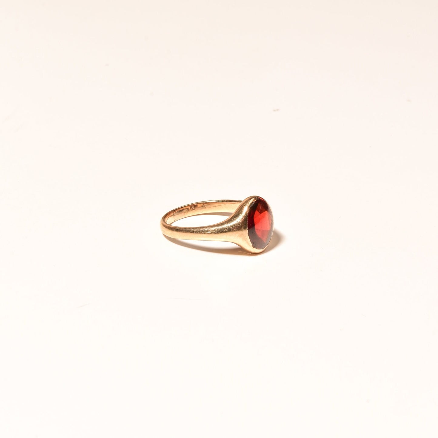 14K yellow gold signet pinky ring with round cabochon garnet, minimalist design, size 7 US