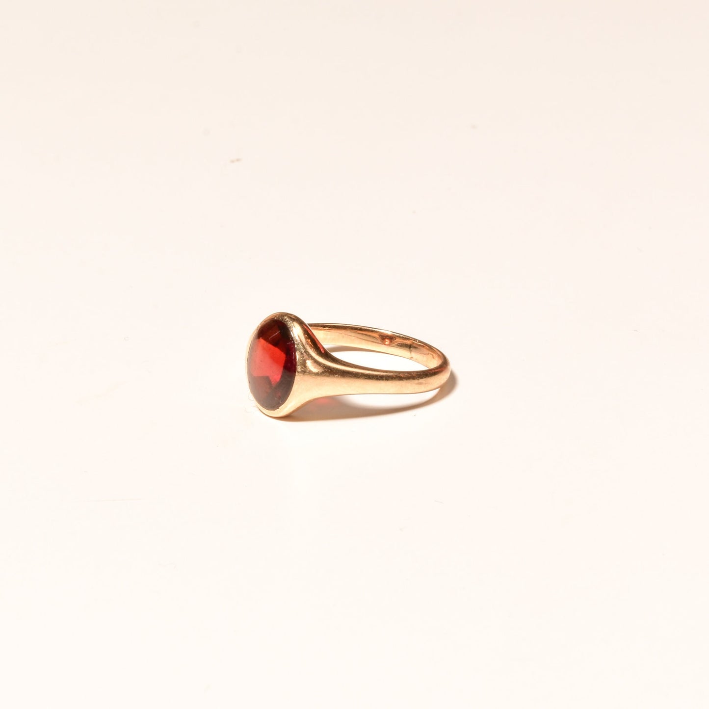 14K yellow gold signet ring with round cabochon garnet gemstone, sleek minimalist design, men's pinky ring size 7 US