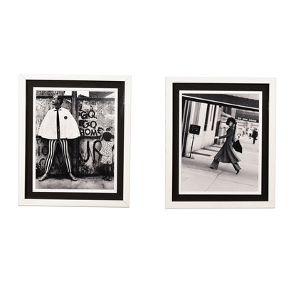 Black and white framed prints showing stylized vintage fashion photography from Vogue magazine, depicting models posing in street scenes, suitable as retro wall art decor.