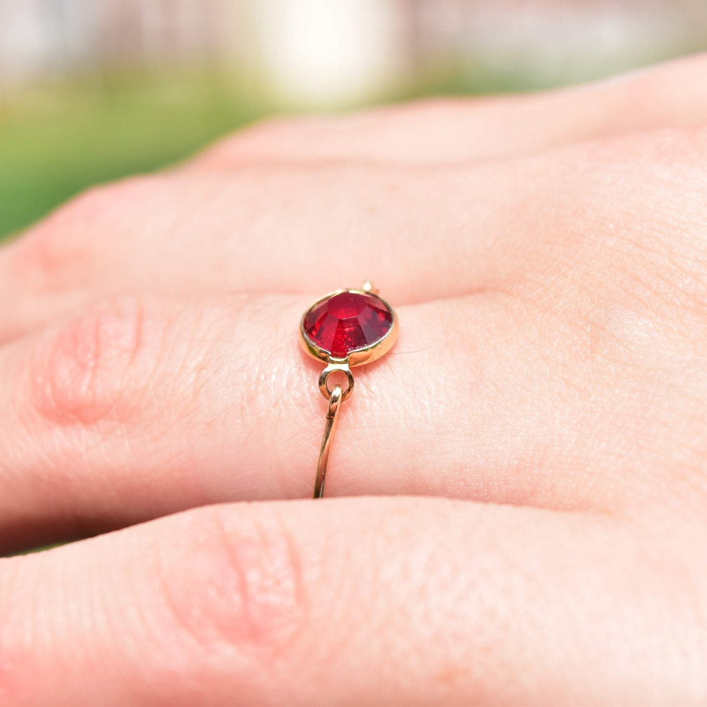 Minimalist 10K Ruby Swivel Ring, Yellow Gold Wire Band, Faceted Red Stone, Stacking Ring, Size 6 1/2 US