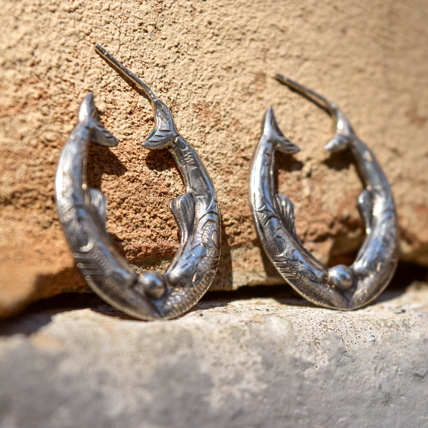 Engraved sterling silver fish hoop earrings with mirrored etched design, 30mm oval pierced hoops