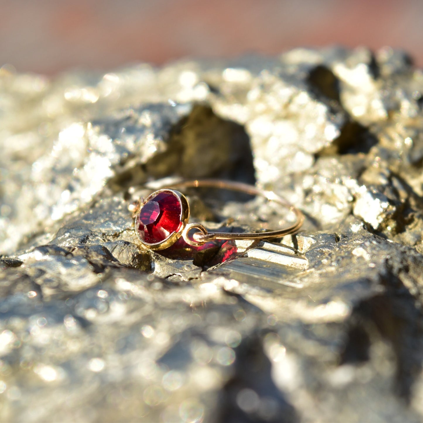 Minimalist 10K Ruby Swivel Ring, Yellow Gold Wire Band, Faceted Red Stone, Stacking Ring, Size 6 1/2 US