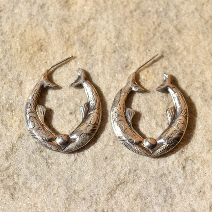 Engraved sterling silver fish hoop earrings featuring mirrored etched fish design on 30mm pierced oval hoops