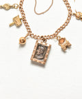 Eclectic 14K Charm Bracelet W/ Large Cameo Locket, Cute Gold Figurine Charms, 4.5mm Curb Link Chain, 7 3/4" L - Good's Vintage