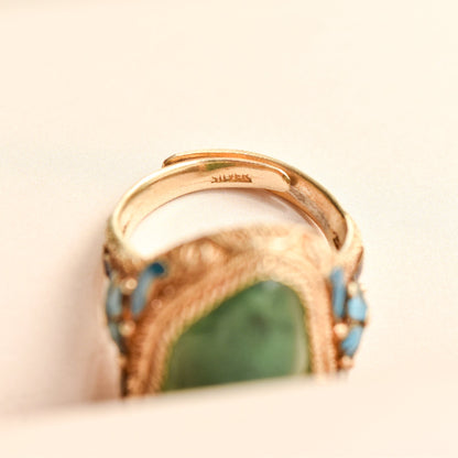 Vintage Chinese export vermeil silver ring with floral enamel accents and a green jade gemstone, adjustable size 7 to 11.