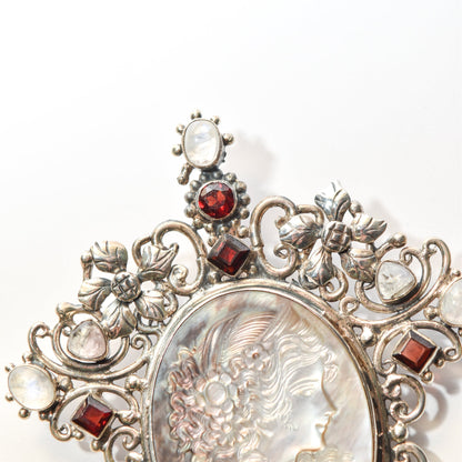 Victorian style sterling silver cameo pendant brooch with multiple stones and ornate design, 4 inches long.