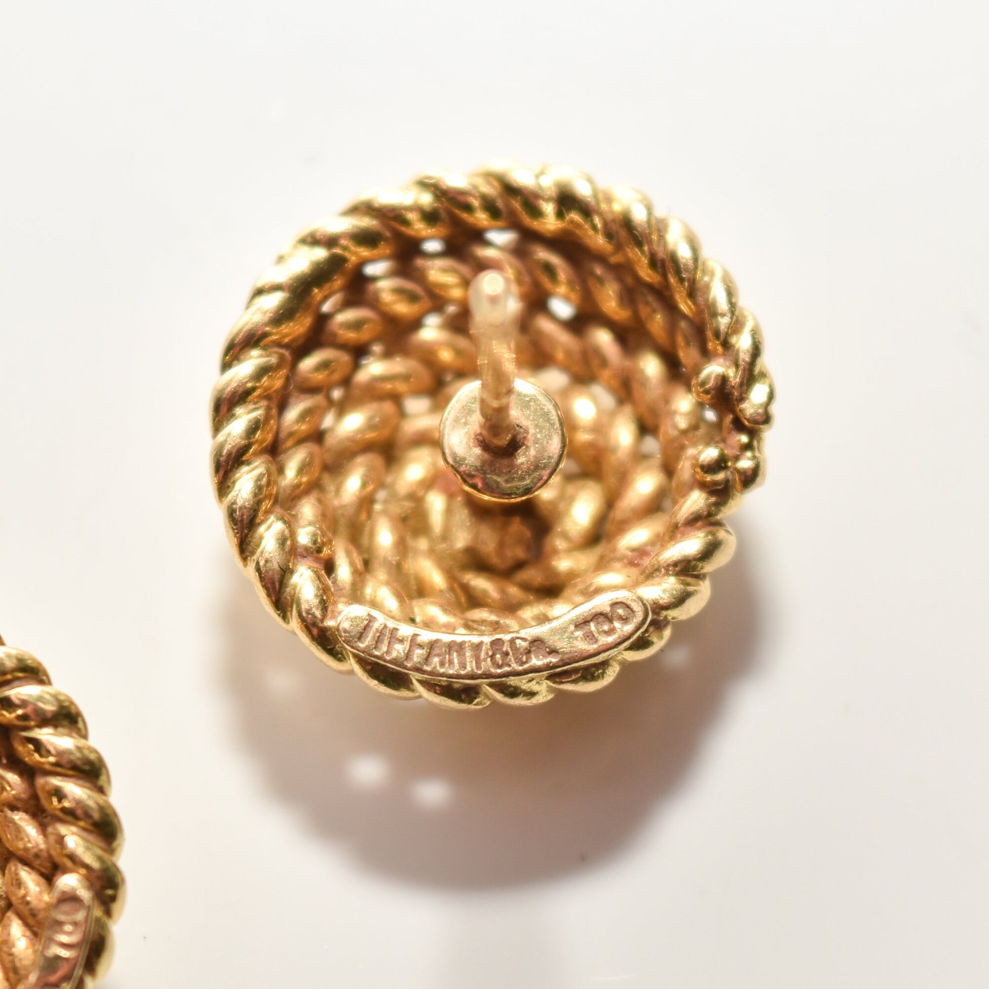 Tiffany & Co Schlumberger 18K gold coiled rope button stud earrings, intricate woven design, high-end estate jewelry close-up, 14.5mm size