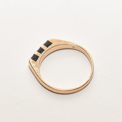 Minimalist 14K gold ring with black onyx inlay, striped design, size 5.5 stacking ring on white background.