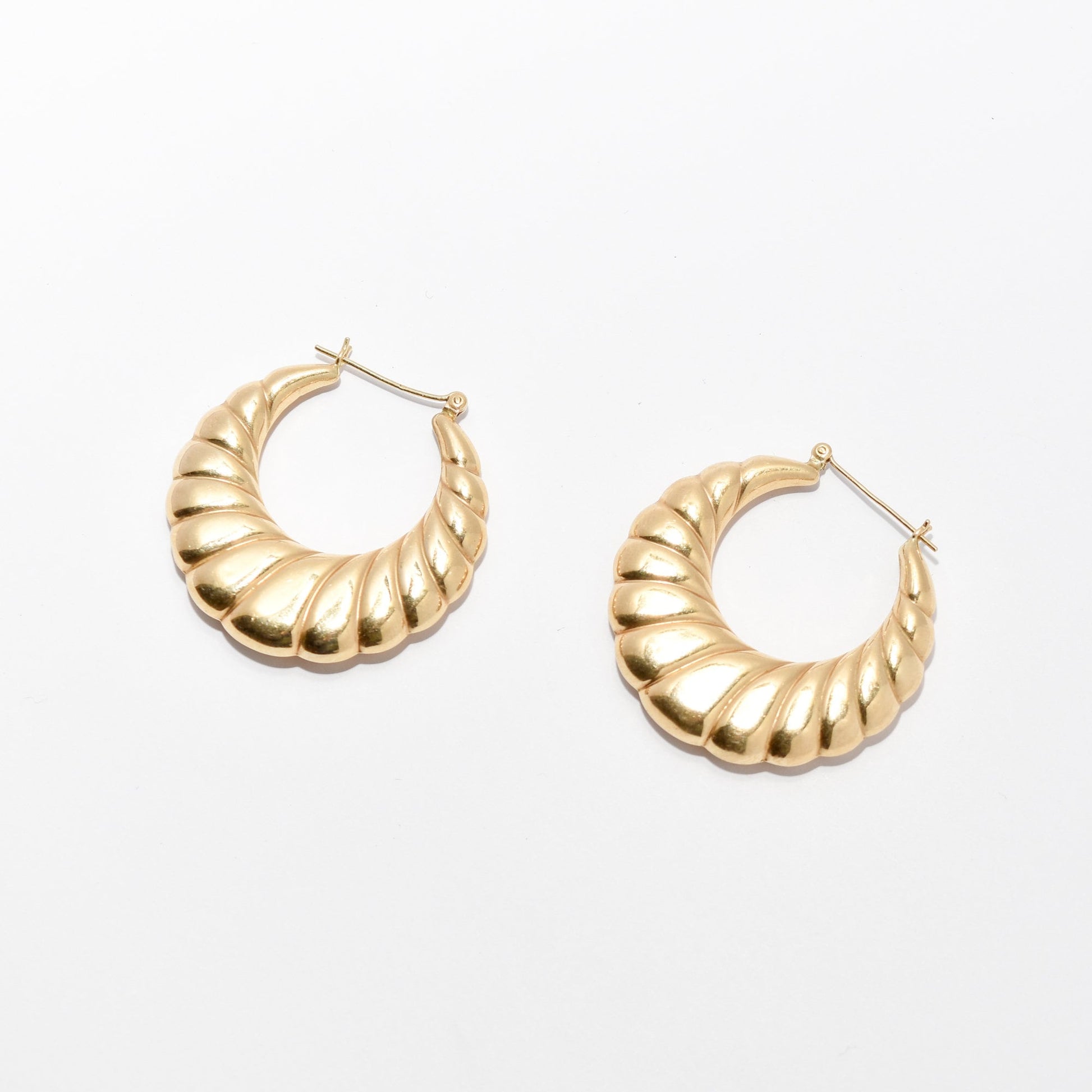 MCM 14K yellow gold puffed scallop hoop earrings medium size estate jewelry on white background